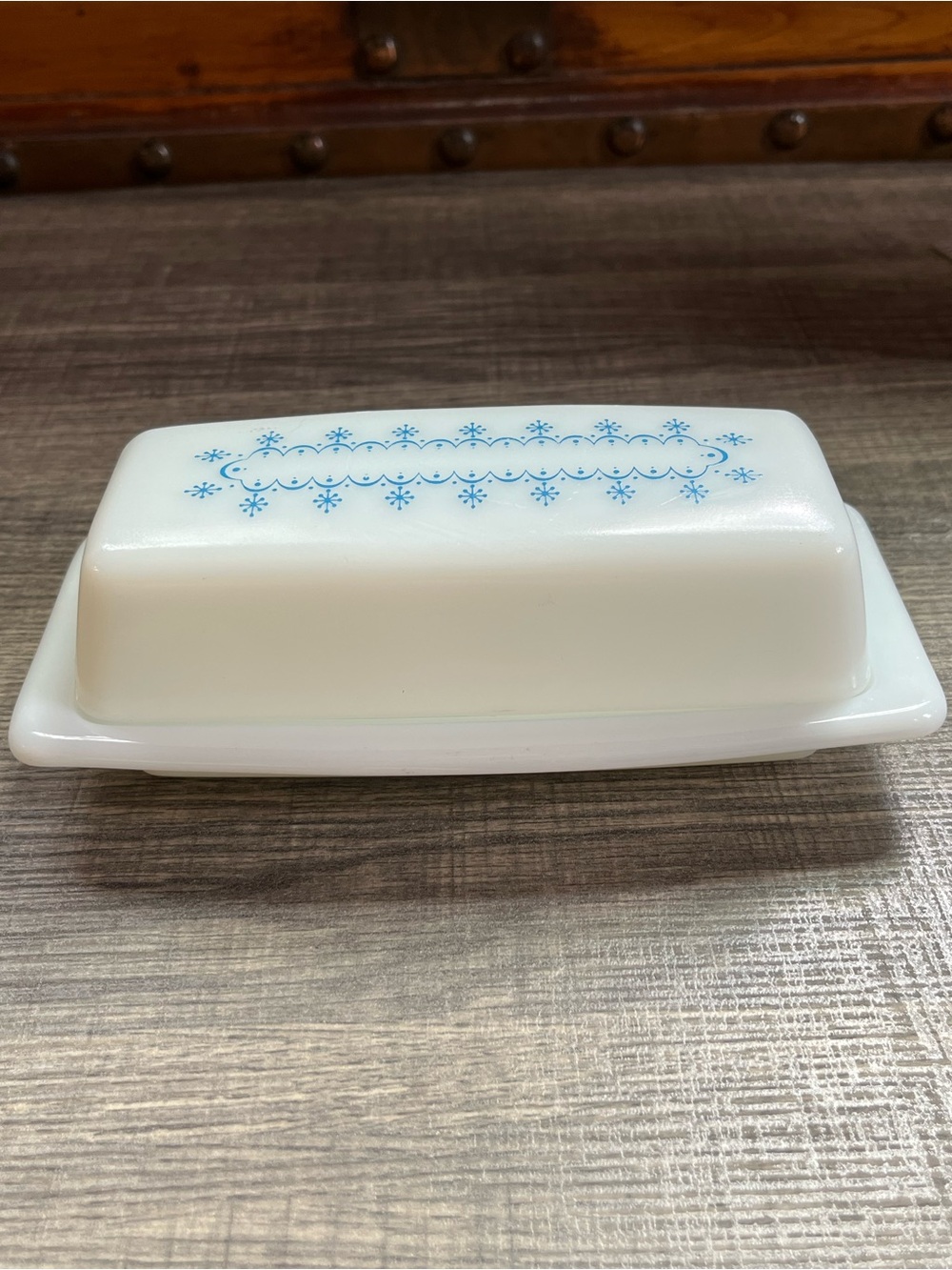 Vintage PYREX White Milk Glass Butter Dish with Blue Retro design.